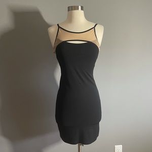 Bebe Fitted black and sheer dress!